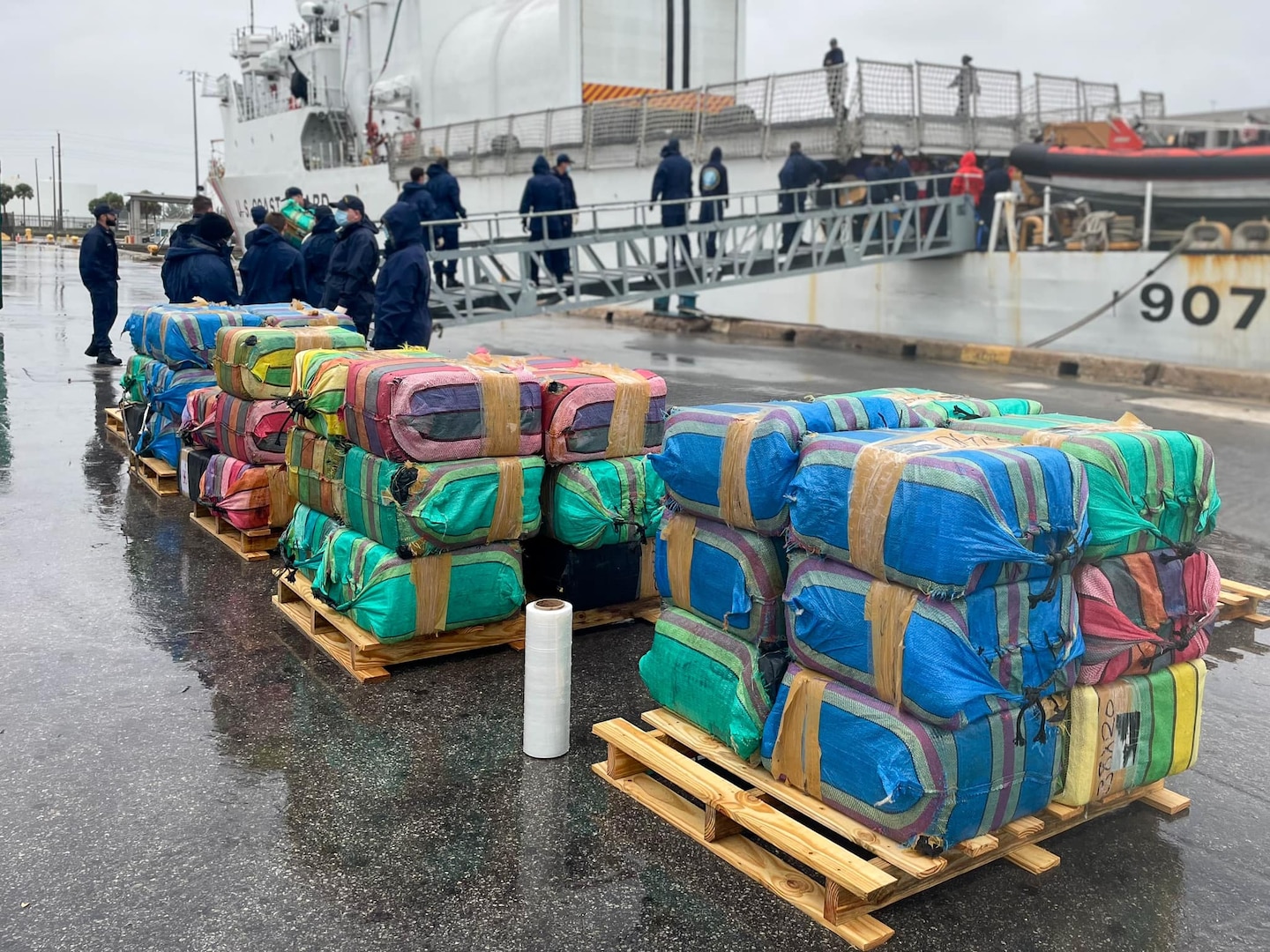 U.S. Coast Guard Cutter Escanaba’s crew offload more than 7,700 pounds of cocaine worth over $102 million at Port Everglades, Florida, Nov. 15, 2023. The offloaded drugs were interdicted during four separate cases in the international waters of the eastern Pacific Ocean by the crews of U.S. Coast Guard Cutter Waesche, Escanaba, a U.S. Coast Guard Helicopter Interdiction Tactical Squadron aircrew, a Coast Guard Tactical Law Enforcement Team, and federal and international partners.