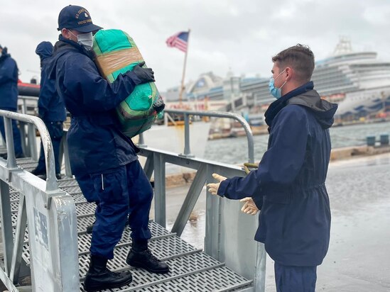 U.S. Coast Guard Cutter Escanaba’s crew offload more than 7,700 pounds of cocaine worth over $102 million at Port Everglades, Florida, Nov. 15, 2023. The offloaded drugs were interdicted during four separate cases in the international waters of the eastern Pacific Ocean by the crews of U.S. Coast Guard Cutter Waesche, Escanaba, a U.S. Coast Guard Helicopter Interdiction Tactical Squadron aircrew, a Coast Guard Tactical Law Enforcement Team, and federal and international partners.