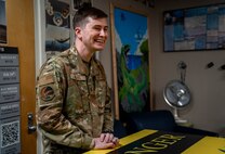 U.S. Air Force Staff Sgt. Darren Weeks, 81st Communications Squadron client systems supervisor, stands in the 81st CS heritage room at Keesler Air Force Base, Mississippi, Nov. 7, 2023.