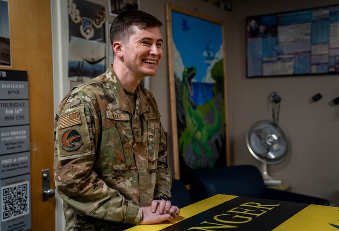 U.S. Air Force Staff Sgt. Darren Weeks, 81st Communications Squadron client systems supervisor, stands in the 81st CS heritage room at Keesler Air Force Base, Mississippi, Nov. 7, 2023.