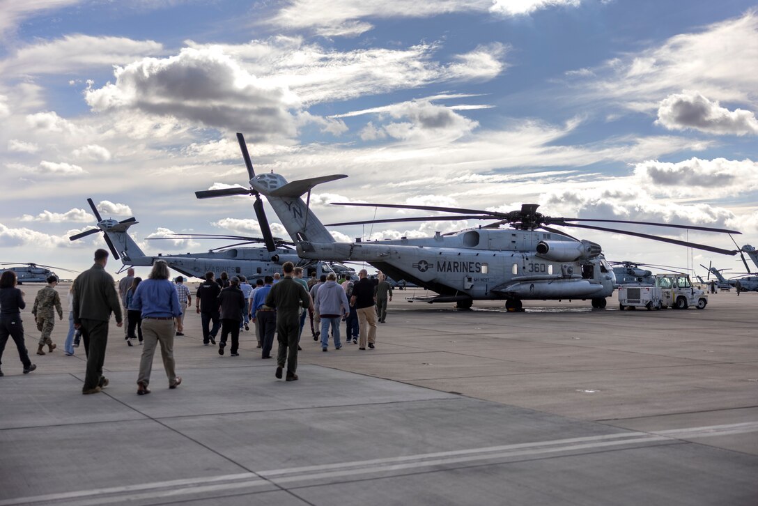 U.S. Space Force Guardians with Space Systems Command and Mobile User Objective System Program Office personnel tour a CH-53E Super Stallion equipped with DI Medium capability with Marine Heavy Helicopter Squadron (HMH) 361, Marine Aircraft Group 16, 3rd Marine Aircraft Wing, during a MUOS capabilities demonstration at Marine Corps Air Station Miramar, California, Nov. 16, 2023. Members of Space Systems Command and the MUOS Program Office engaged with 3rd MAW and I Marine Expeditionary Force Marines to understand end-user considerations and see MUOS used at the tactical level. MUOS elevates Marine Corps warfighting capabilities by enhancing long-range, rapid communication and expanding the operational reach of the U.S. Armed Forces. (U.S. Marine Corps Photo by Cpl. Daniel Childs)