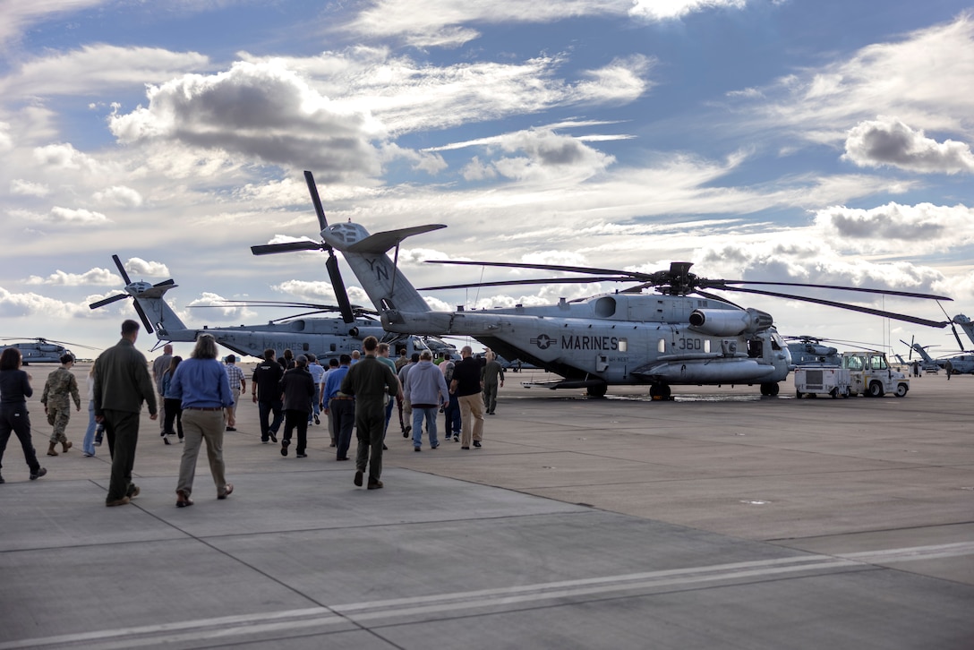 U.S. Space Force Guardians with Space Systems Command and Mobile User Objective System Program Office personnel tour a CH-53E Super Stallion equipped with DI Medium capability with Marine Heavy Helicopter Squadron (HMH) 361, Marine Aircraft Group 16, 3rd Marine Aircraft Wing, during a MUOS capabilities demonstration at Marine Corps Air Station Miramar, California, Nov. 16, 2023. Members of Space Systems Command and the MUOS Program Office engaged with 3rd MAW and I Marine Expeditionary Force Marines to understand end-user considerations and see MUOS used at the tactical level. MUOS elevates Marine Corps warfighting capabilities by enhancing long-range, rapid communication and expanding the operational reach of the U.S. Armed Forces. (U.S. Marine Corps Photo by Cpl. Daniel Childs)