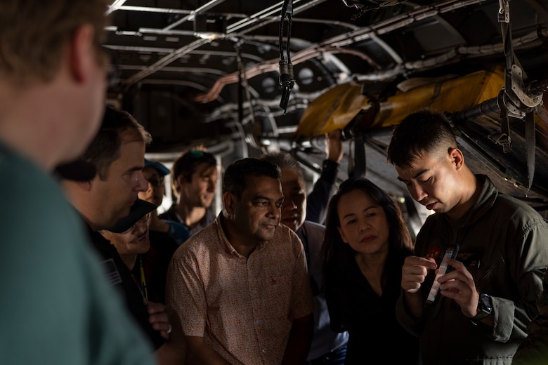 U.S. Marine Corps Capt. Akerin Lab, the digital interoperability coordinator with 3rd Marine Aircraft Wing, demonstrates Mobile User Objective System technology on a Marine Air Ground Tablet to MUOS Program Office personnel at Marine Corps Air Station Miramar, California, Nov. 16, 2023. Members of Space Systems Command and the MUOS Program Office engaged with 3rd MAW and I Marine Expeditionary Force Marines to understand end-user considerations and see MUOS used at the tactical level. MUOS elevates Marine Corps warfighting capabilities by enhancing long-range, rapid communication and expanding the operational reach of the U.S. Armed Forces. (U.S. Marine Corps Photo by Cpl. Daniel Childs)