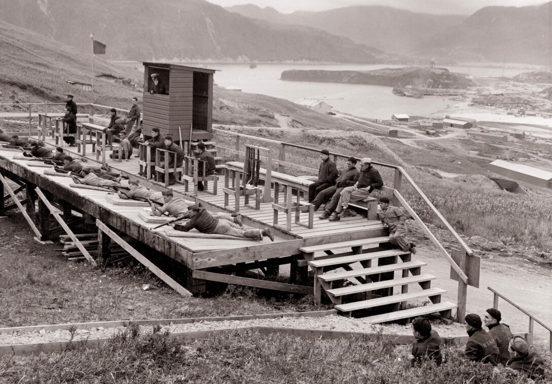 Sailors practice their marksmanship from a shooting stand at Dutch Harbor Naval Air Station on Aug. 25, 1943.