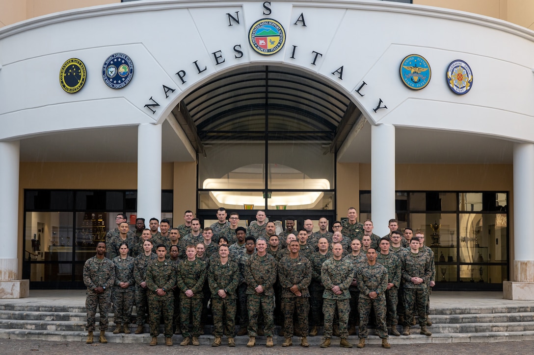 U.S. Marines with Task Force 61/2 pose for a group photo at Naval Support Activity Naples, Italy, Nov. 16, 2023. TF 61/2 is deployed in the U.S. Naval Forces Europe areas of operation, employed by U.S. Sixth Fleet to defend U.S., allied and partner interests. (U.S. Marine Corps photo by Lance Cpl. Jack Labrador)