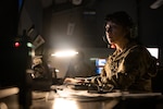 Connecticut Air National Guard Tech Sgt. Payton Kelley, a mission systems operator assigned to the 103d Air Control Squadron, monitors radar and electronic systems to assist pilots conducting defensive counter-air operations during a training exercise at Orange Air National Guard Station, Orange, Connecticut, Oct. 31, 2023. As a mission systems operator, Kelley detects, tracks, identifies, plots and disseminates information in the battle management area to assist friendly pilots and ground forces.