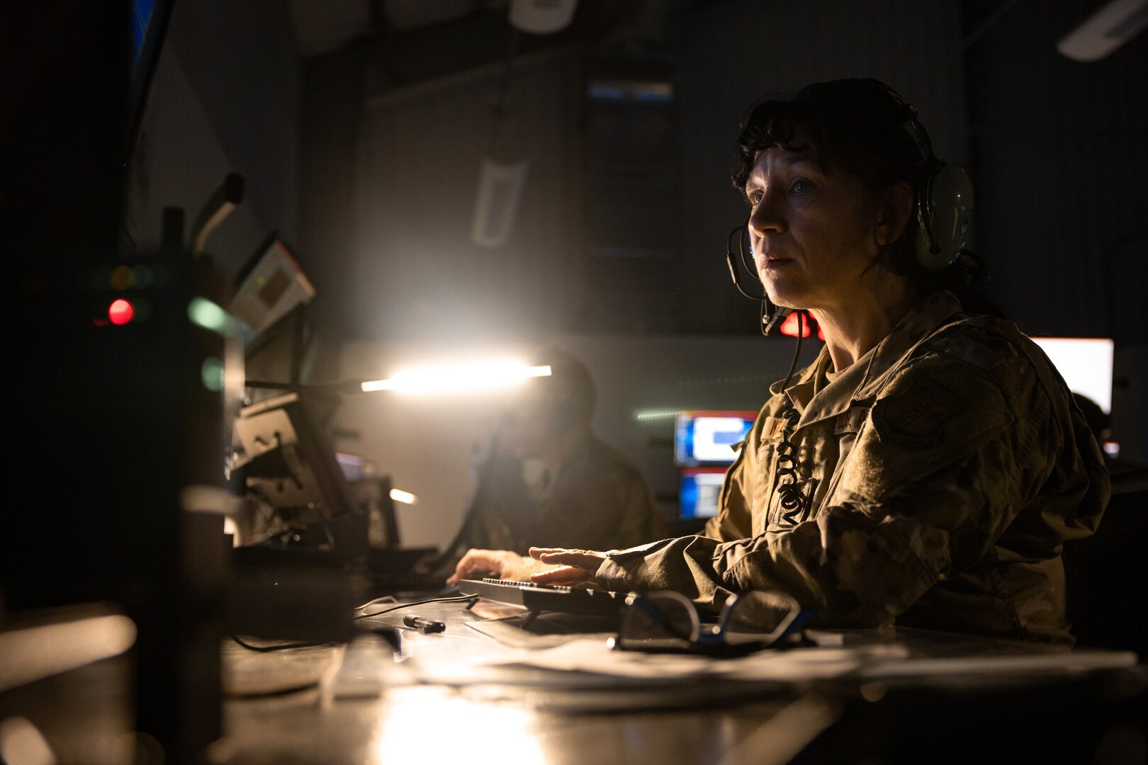 Connecticut Air National Guard Tech Sgt. Payton Kelley, a mission systems operator assigned to the 103d Air Control Squadron, monitors radar and electronic systems to assist pilots conducting defensive counter-air operations during a training exercise at Orange Air National Guard Station, Orange, Connecticut, Oct. 31, 2023. As a mission systems operator, Kelley detects, tracks, identifies, plots and disseminates information in the battle management area to assist friendly pilots and ground forces.