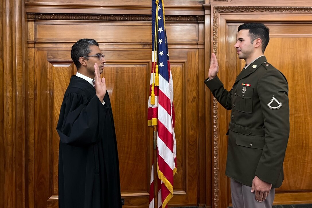 Pfc. Matt Fromzero -- formerly Mehmet Odabasi -- of the 2nd Infantry Brigade Combat Team receives U.S. citizenship during a ceremony at the Joseph F. Weis, Jr. U.S. Courthouse in Pittsburgh, Pennsylvania, Nov. 17, 2023. Fromzero is a political refugee from Turkey. (Courtesy Photo)