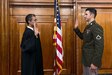 Pfc. Matt Fromzero -- formerly Mehmet Odabasi -- of the 2nd Infantry Brigade Combat Team receives U.S. citizenship during a ceremony at the Joseph F. Weis, Jr. U.S. Courthouse in Pittsburgh, Pennsylvania, Nov. 17, 2023. Fromzero is a political refugee from Turkey. (Courtesy Photo)