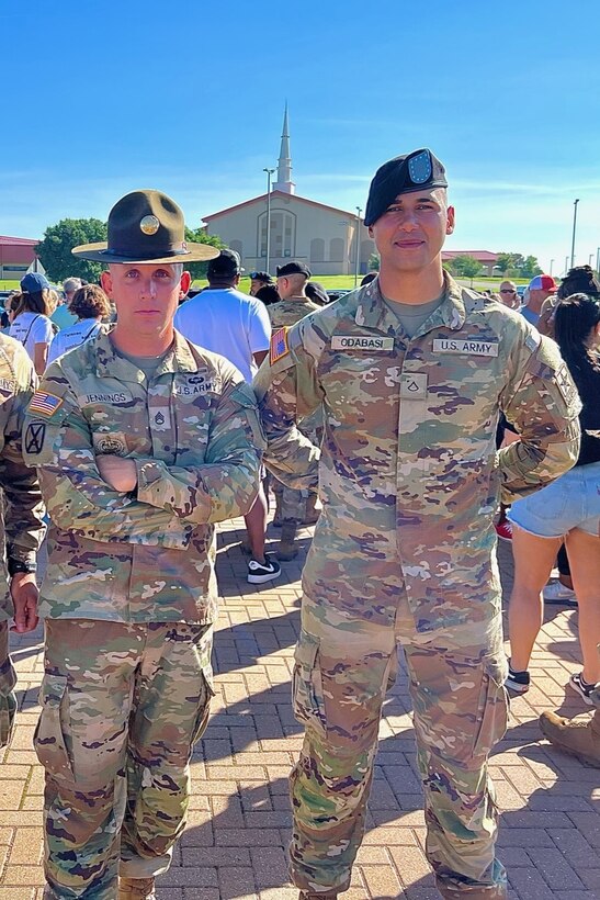 U.S. Army Pfc. Matt Fromzero, formerly Pfc. Mehmet Odabasi, poses for a photo with one of his drill sergeants during Basic Combat Training at Fort Sill, Oklahoma, June 2023. Fromzero is a political refugee from Turkey who received U.S. citizenship after his BCT graduation. (Courtesy Photo)
