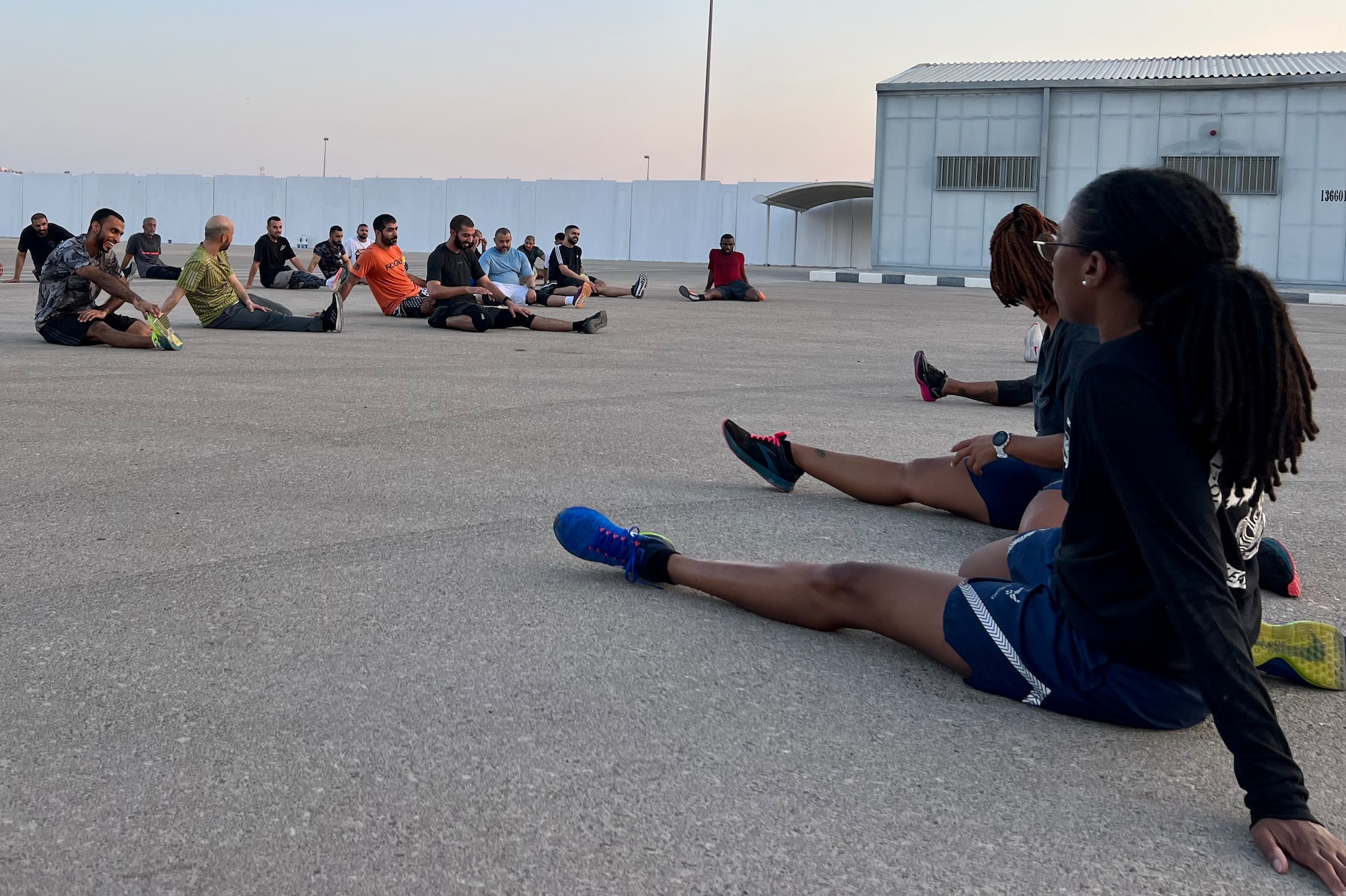 Barnes Center for Enlisted Education instructors lead United Arab Emirates Air Force professional military education students in an early morning physical training session in the UAE, Oct. 12, 2023. Five BCEE instructors traveled to the UAE to deliver noncommissioned officer leadership PME, Oct. 2 to Oct. 28, 2023. (Courtesy photo)