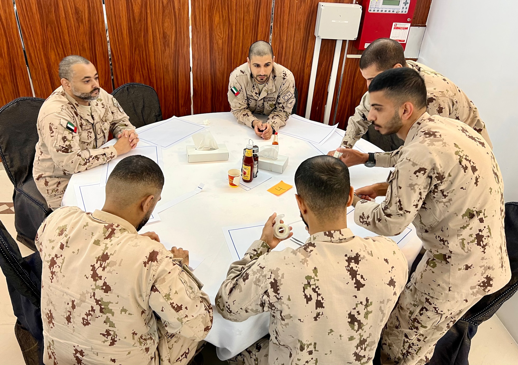 United Arab Emirates Air Force students participate in a professional military education exercise during a class in UAE, Oct. 13, 2023. Five BCEE instructors traveled to the UAE to deliver the noncommissioned officer leadership PME, Oct. 2 to Oct. 28, 2023. (Courtesy photo)