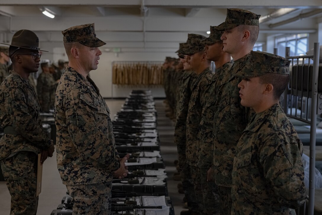 U.S. Marine Corps Lt. Col. James Smith, commanding officer, 2nd Recruit Training Battalion, talks to Marines during the battalion commander’s inspection for Golf Company 2nd Recruit Training Battalion, at Marine Corps Recruit Depot, San Diego, Nov. 15, 2023. The battalion commander’s inspection surveys new Marines knowledge, bearing, and attention to detail as one of their last tests before graduating. (U.S. Marine Corps photo by Lance Cpl. Jacob B. Hutchinson)