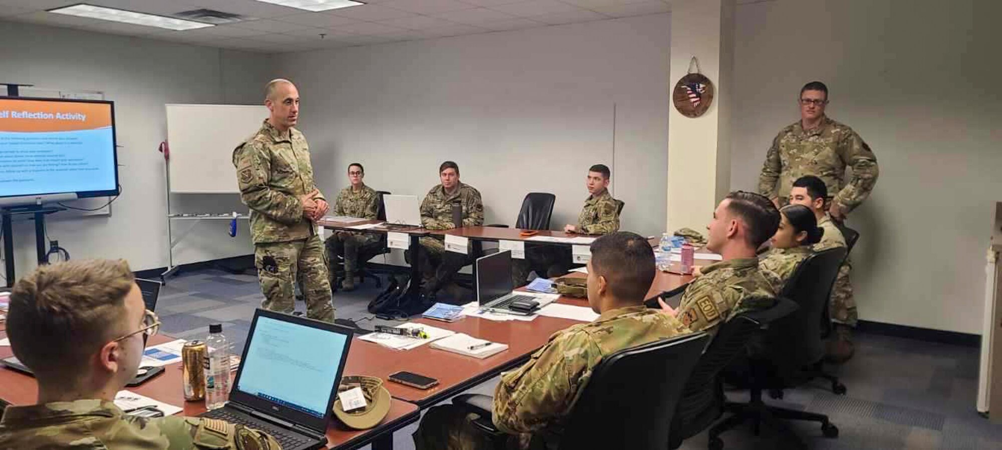 Col. Damian Schlussel, Barnes Center for Enlisted Education commander, talks with students from the inaugural initial operational capability of the Junior Enlisted Foundations 300 course at the Robert D. Gaylor Noncommissioned Officer Academy on Joint Base San Antonio-Lackland, Nov. 15, 2023. (Courtesy photo)