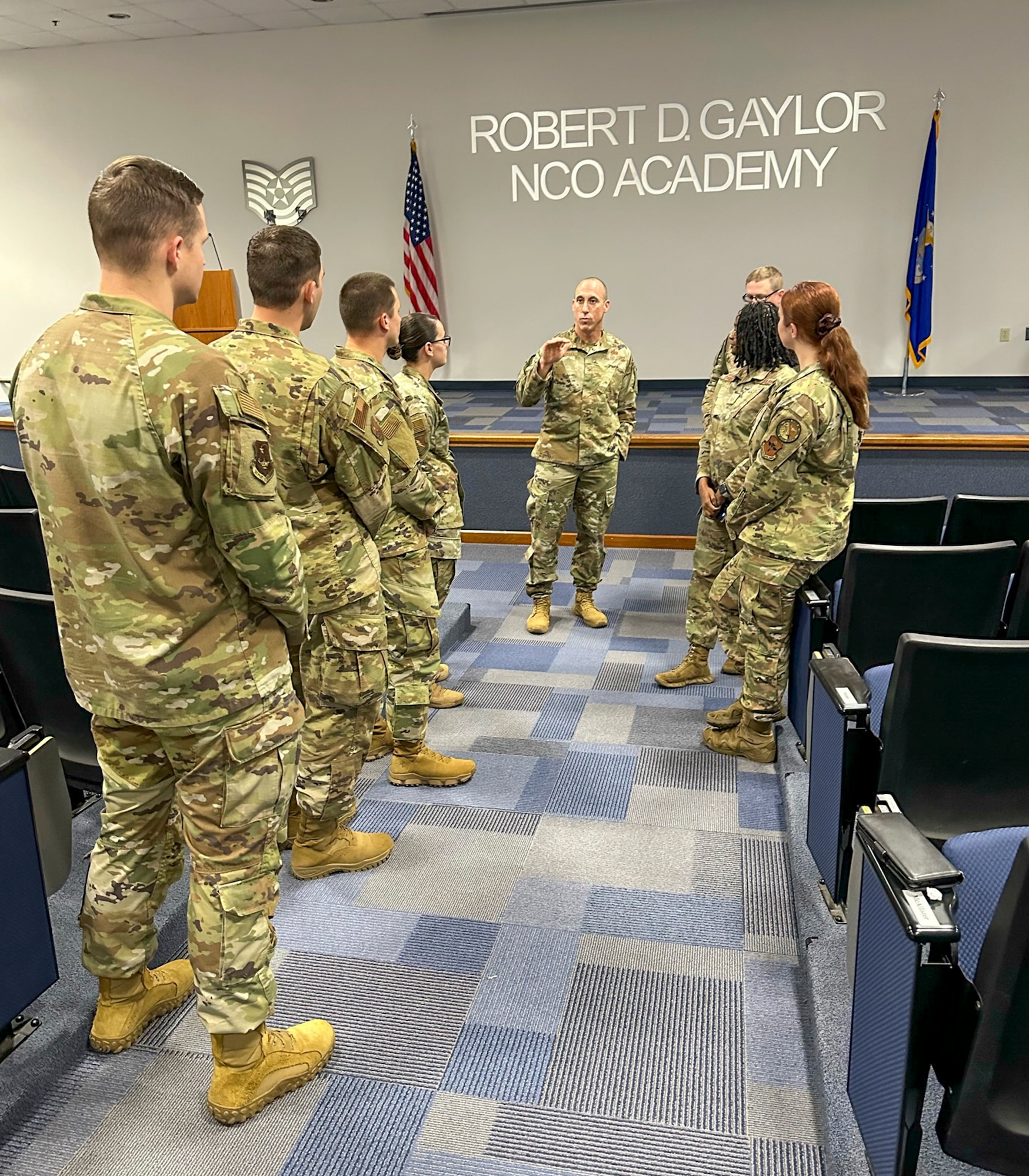 Col. Damian Schlussel, Barnes Center for Enlisted Education commander, talks with students and instructors from the inaugural initial operational capability of the Junior Enlisted Foundations 300 course at the Robert D. Gaylor Noncommissioned Officer Academy on Joint Base San Antonio-Lackland, Nov. 16, 2023. (Courtesy photo)