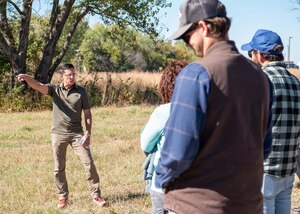 Natural Resources Manager leads an onsite tour of prairie restoration areas.