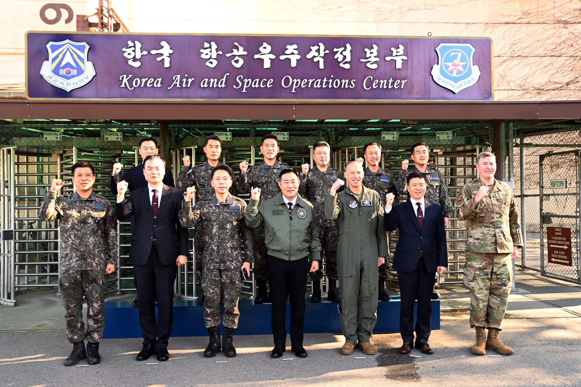 Republic of Korea Minister of National Defense Won-sik Shin, center first row, stands with ROK officials, 7th Air Force and ROK Air Force Operations Command leadership during a visit to the 607th Air Operations Center, Osan Air Base, ROK, Nov. 21, 2023.