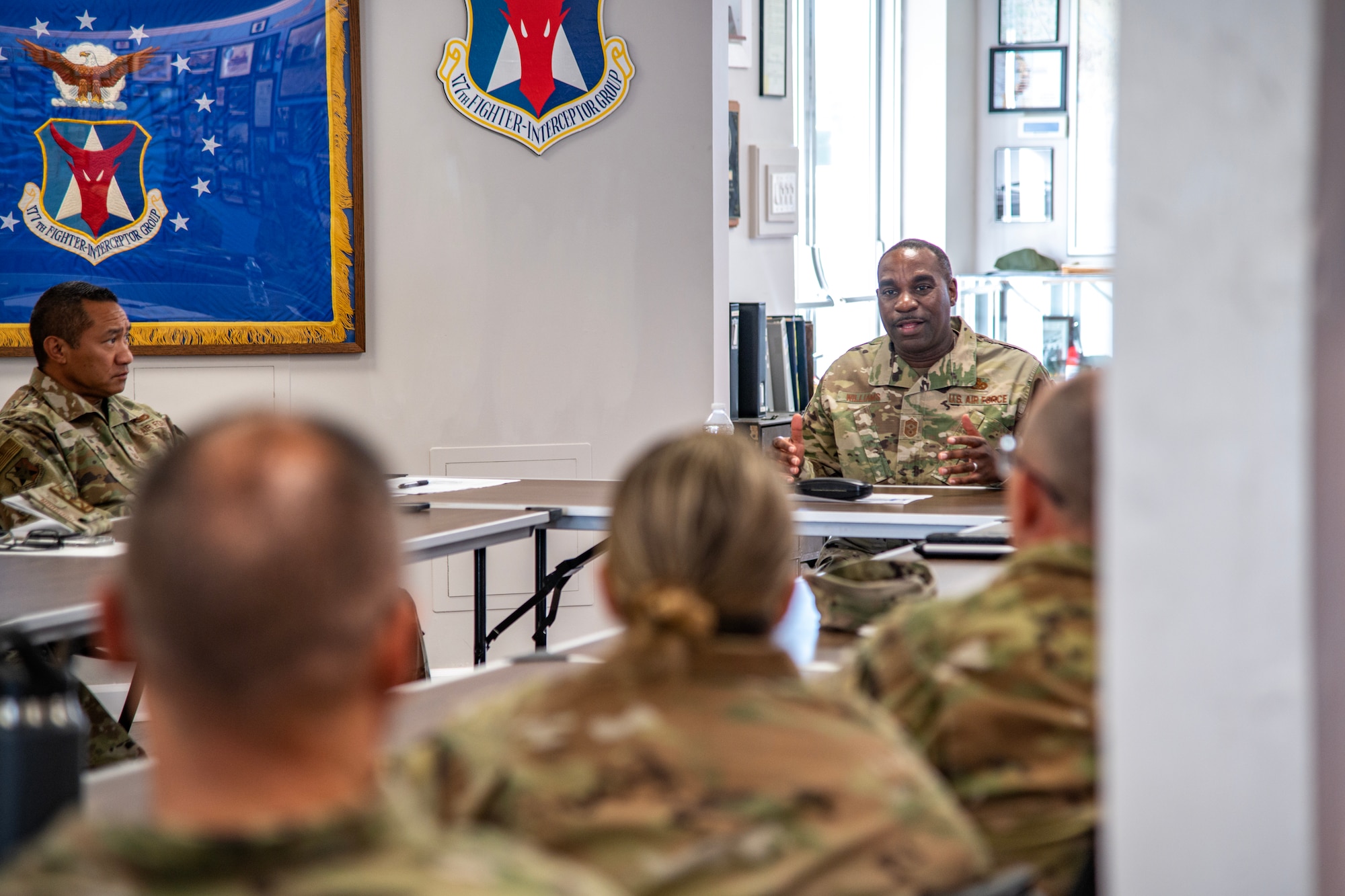 A photo of Chief Master Sgt. Maurice L. Williams speaking to Airmen of the 177th Fighter Wing.