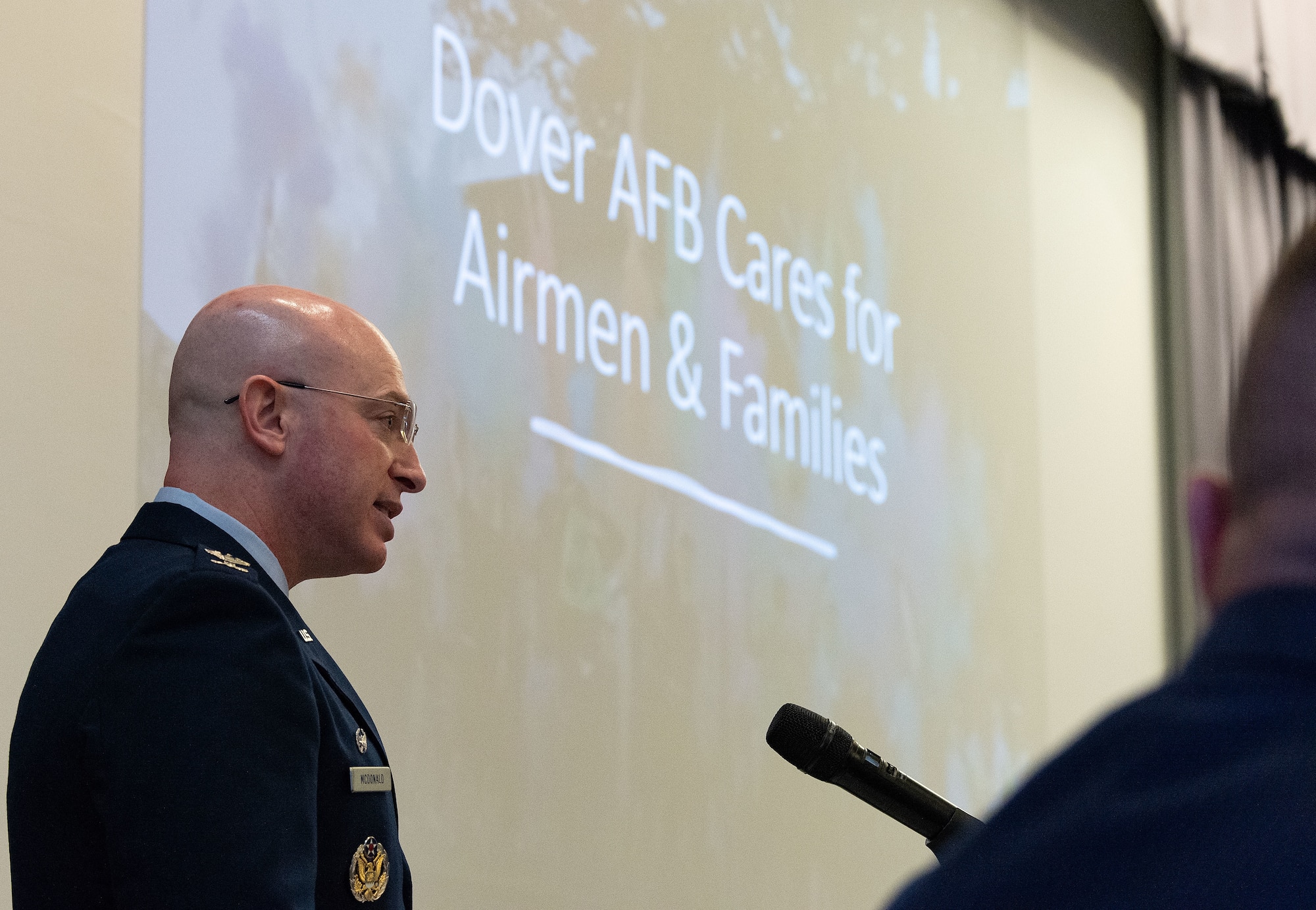 U.S. Air Force Col. Chris McDonald, 436th Airlift Wing commander, addresses attendees at the 2023 State of the Base briefing on Dover Air Force Base, Delaware, Nov. 20, 2023. The event, hosted by the Central Delaware Chamber of Commerce, provided an opportunity to educate and inform community members and leaders on how the Dover community ties into the base's mission, vision, and priorities. (U.S. Air Force photo by Roland Balik)