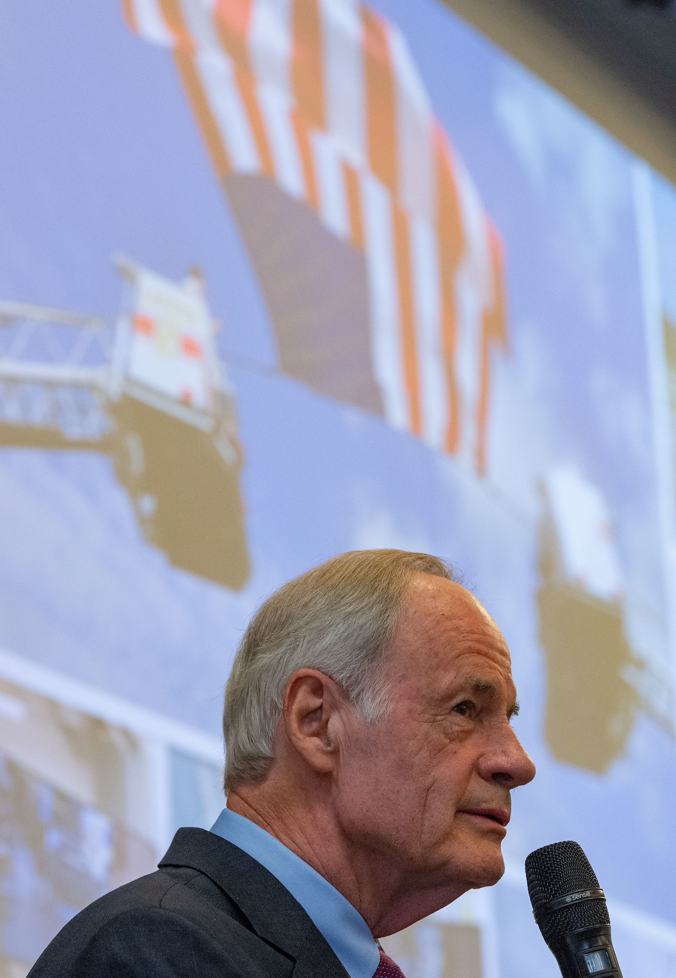 U.S. Sen. Tom Carper, addresses U.S. congressional delegates from Delaware, Central Delaware Chamber of Commerce members, local civic and business leaders, and Team Dover members at the 2023 State of the Base briefing on Dover Air Force Base, Delaware, Nov. 20, 2023. The event, hosted by the CDCC, provided an opportunity to educate and inform community members and leaders on how the Dover community ties into the base's mission, vision and priorities. (U.S. Air Force photo by Roland Balik)