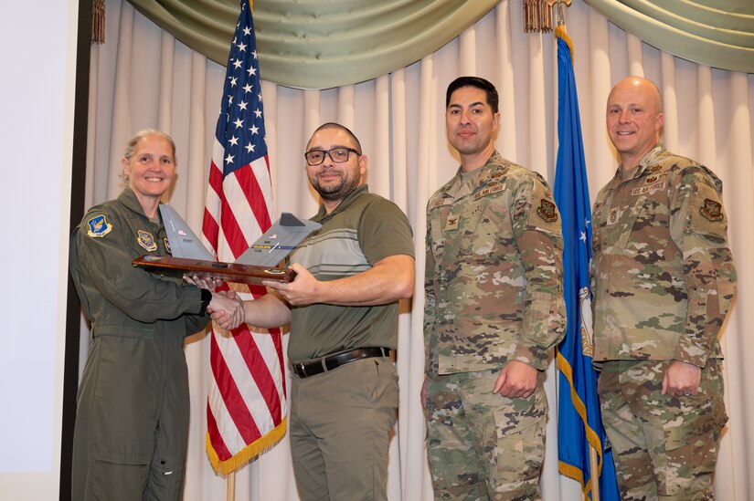 Members from the 305th Air Mobility Wing are recognized during the third quarter awards.