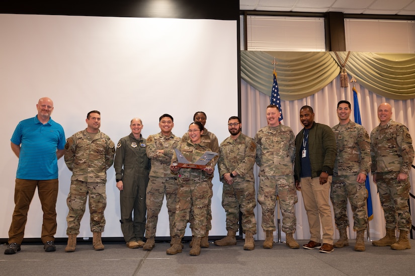 Members from the 305th Air Mobility Wing are recognized during the third quarter awards.