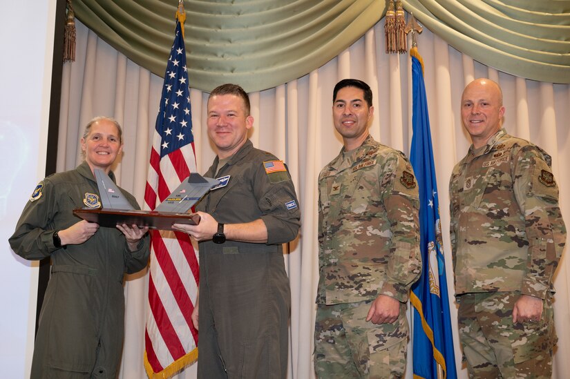 Members from the 305th Air Mobility Wing are recognized during the third quarter awards.