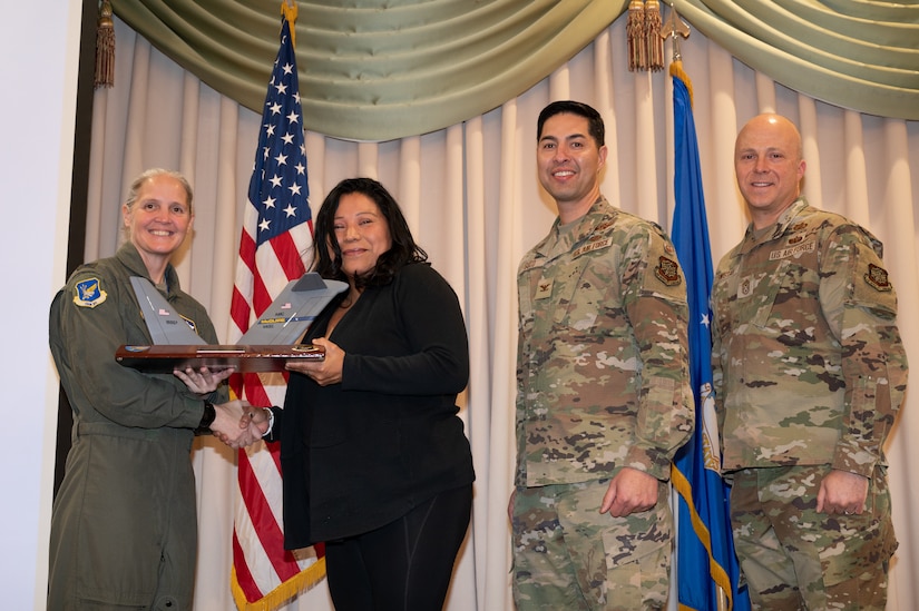 Members from the 305th Air Mobility Wing are recognized during the third quarter awards.