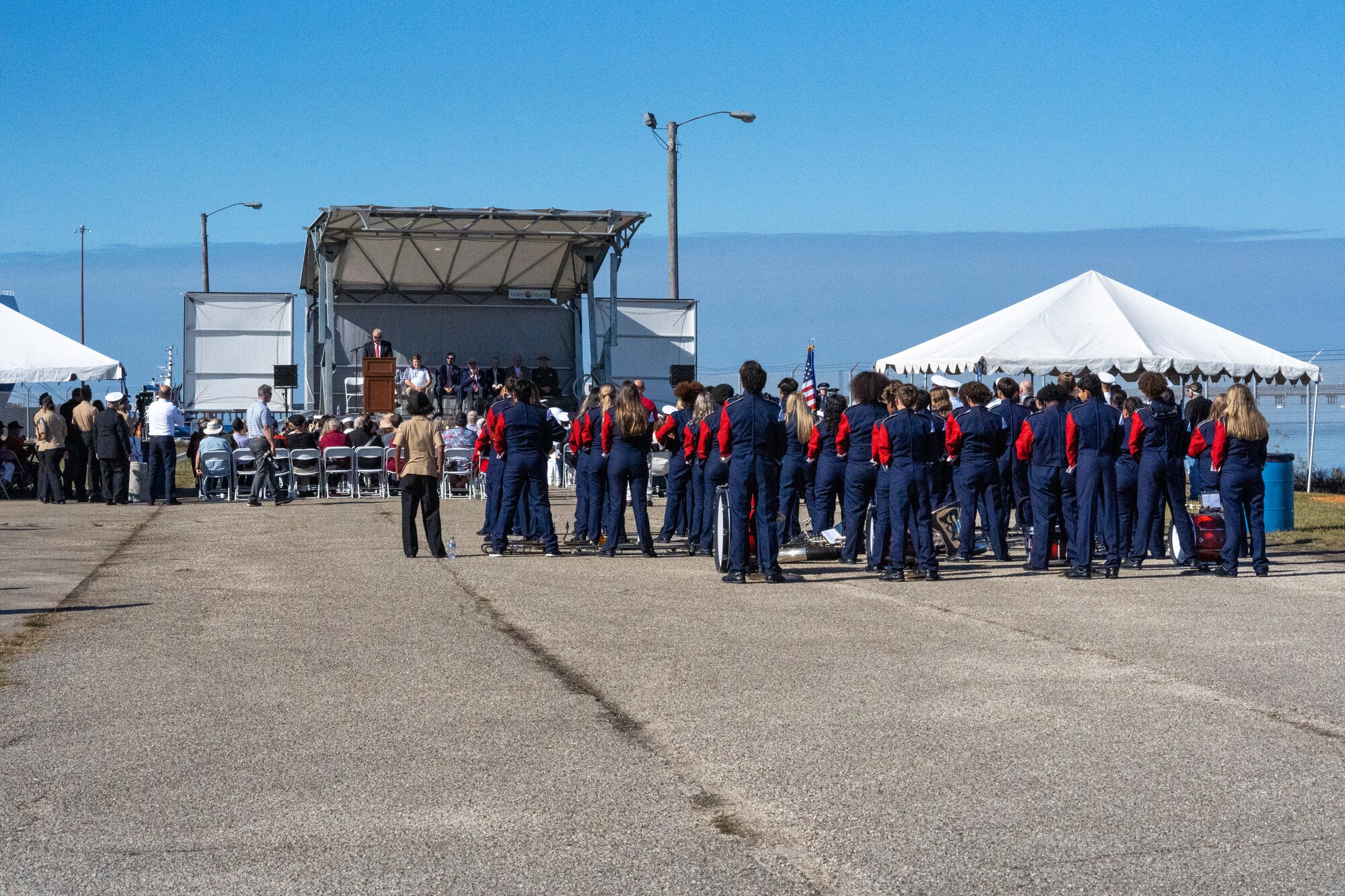 Attendees listen to Jay Williams, Mayor of Pascagoula, make a speech during the City of Pascagoula World War II Heritage Designation ceremony at U.S. Coast Guard Station Pascagoula, Mississippi, Nov. 17, 2023.