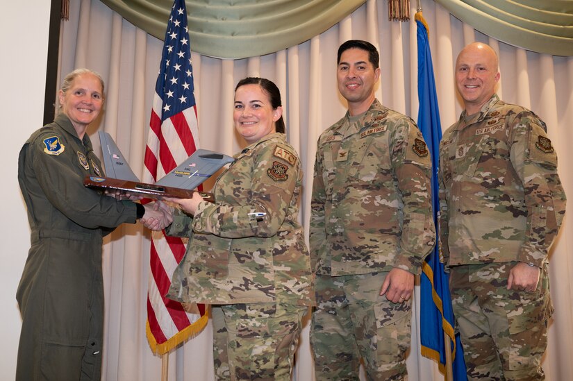 Members from the 305th Air Mobility Wing are recognized during the third quarter awards.