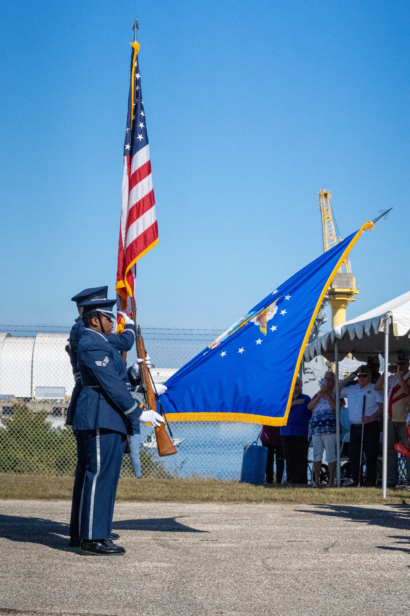 The Keesler Air Force Base Honor Guard presents the colors during the City of Pascagoula World War II Heritage Designation ceremony at U.S. Coast Guard Station Pascagoula, Mississippi, Nov. 17, 2023.