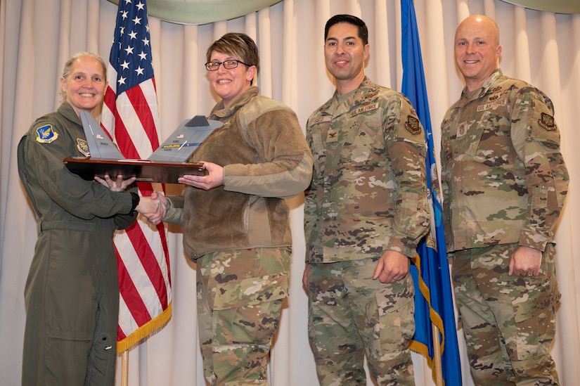 Members from the 305th Air Mobility Wing are recognized during the third quarter awards.