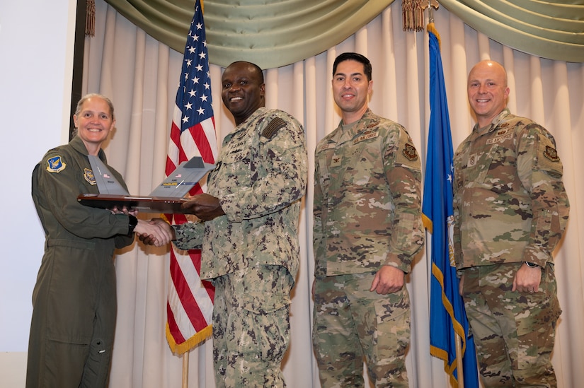 Members from the 305th Air Mobility Wing are recognized during the third quarter awards.