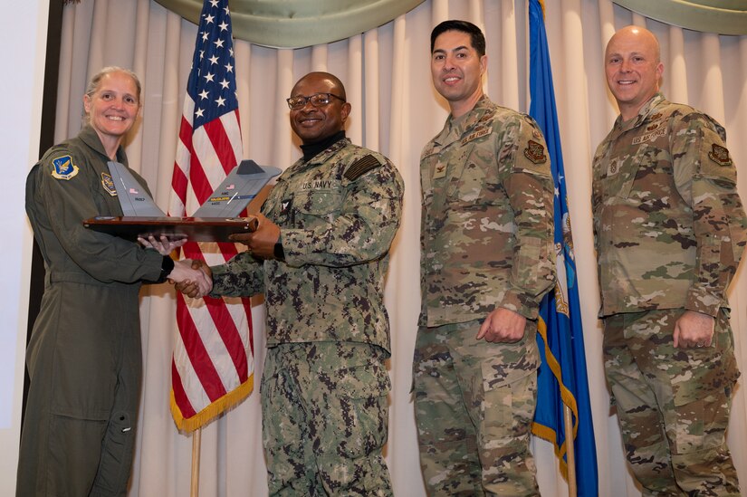 Members from the 305th Air Mobility Wing are recognized during the third quarter awards.