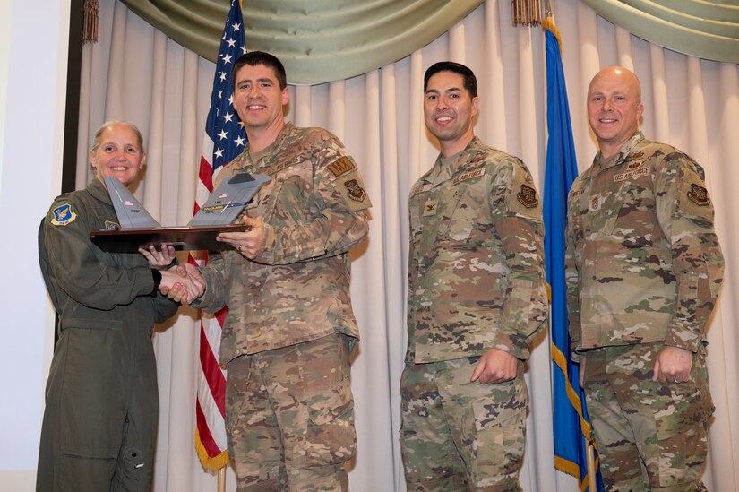 Members from the 305th Air Mobility Wing are recognized during the third quarter awards.