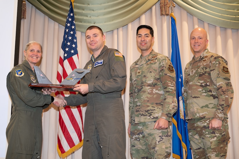 Members from the 305th Air Mobility Wing are recognized during the third quarter awards.