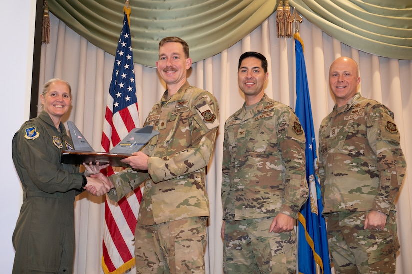 Members from the 305th Air Mobility Wing are recognized during the third quarter awards.