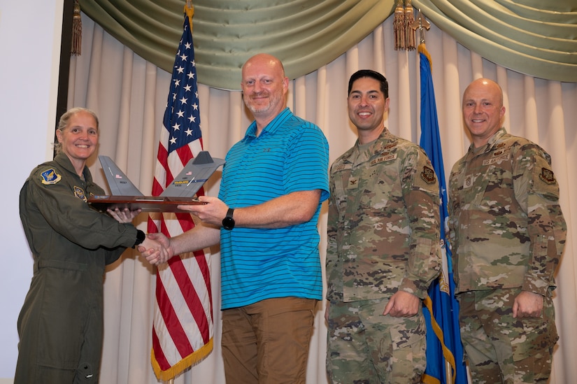 Members from the 305th Air Mobility Wing are recognized during the third quarter awards.