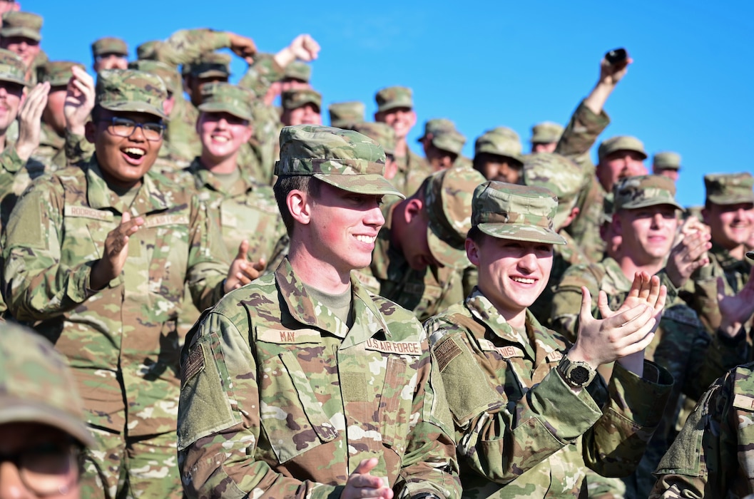 U.S. Airmen assigned to the 312th Training Squadron support their team during the 17th Training Wing Drill Down Competition at Mathis Field, Goodfellow Air Force Base, Texas, Nov. 17, 2023. The 17th TRW drill down from Angelo State University’s ROTC cadets; the 312th, 313th and 315th TRS; as well as the 533rd TRS Detachment 1. (U.S. Air Force photo by Airman 1st Class Madison Collier)