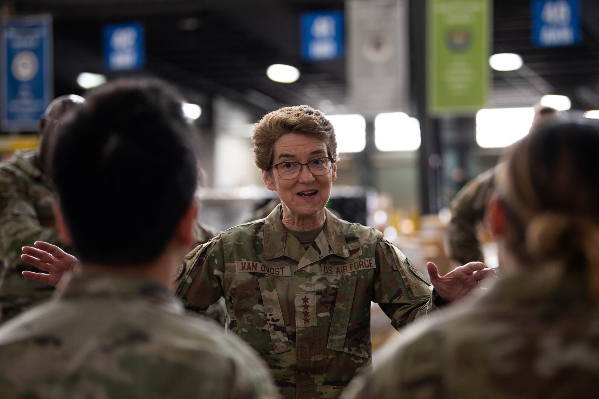 U.S. Air Force Gen. Jacqueline Van Ovost, U.S. Transportation Command commander, speaks with Airmen from the 436th Aerial Port Squadron at Dover Air Force Base, Delaware, Nov. 16, 2023. Van Ovost visited Dover to thank Airmen for their hard work and dedication to amplifying TRANSCOM’s mission. (U.S. Air Force photo by Tech. Sgt. J.D. Strong II)
