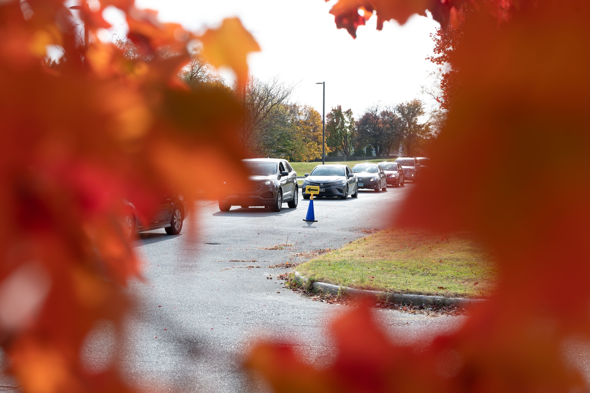 Members of Team Dover wait in a car line during an Operation Turkey Drop event at Dover Air Force Base, Delaware, Nov. 17, 2023. Dover Air Force continues their mission of caring for Airmen by supplying them and their families with Thanksgiving turkeys for the upcoming holiday. (U.S. Air Force photo by Airman 1st Class Dieondiere Jefferies)