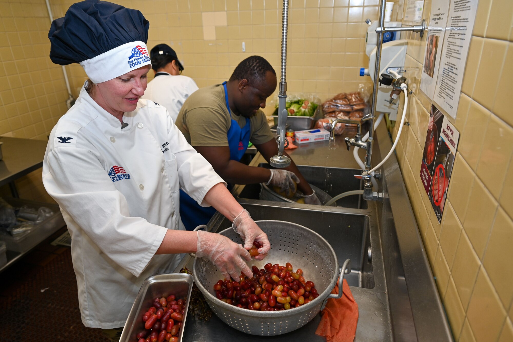 Col. Beach prepares food