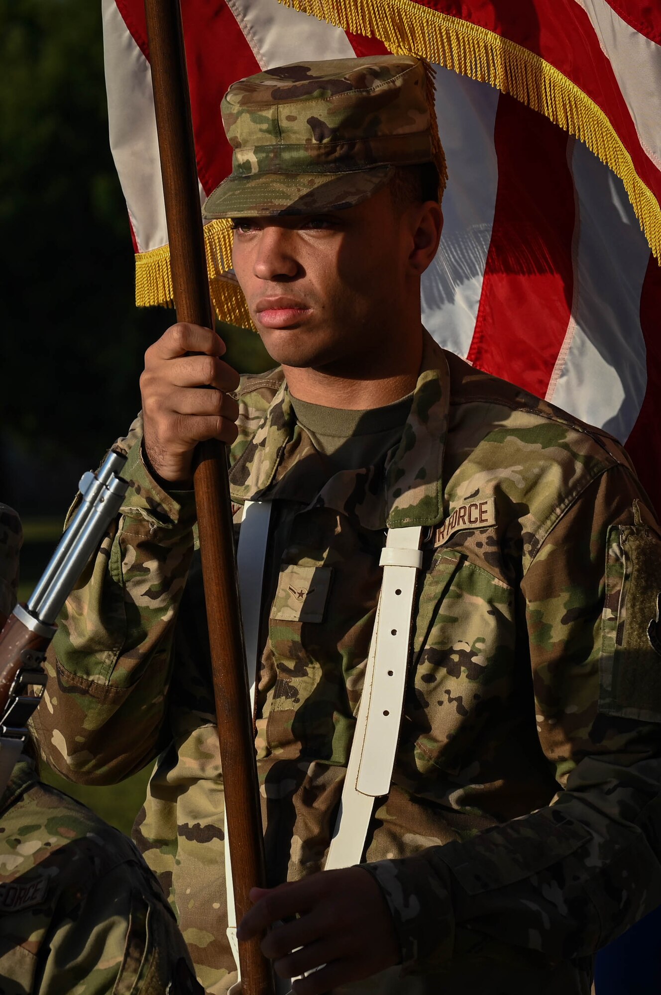 A member of the 81st Training Group drill team marches with the colors to open the Fourth Quarter Drill Down competition on the Levitow Training Support Facility drill pad at Keesler Air Force Base, Mississippi, Oct. 27, 2023.
