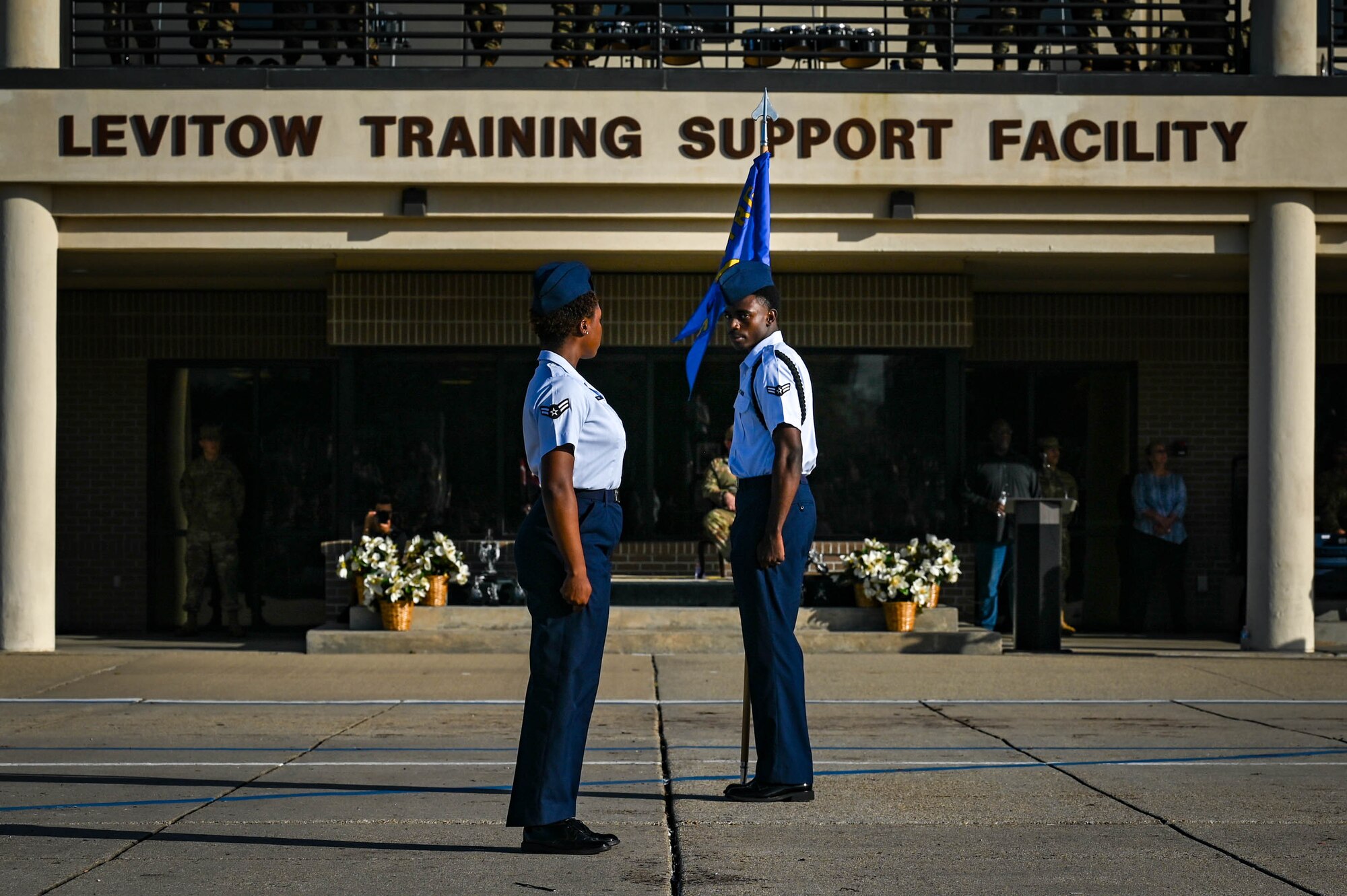 Airmen from the 81st Training Group perform synchronized movements in regulation drill at the Fourth Quarter Drill Down competition at the Levitow Training Support Facility drill pad on Keesler Air Force Base, Mississippi, Oct., 27, 2023.
