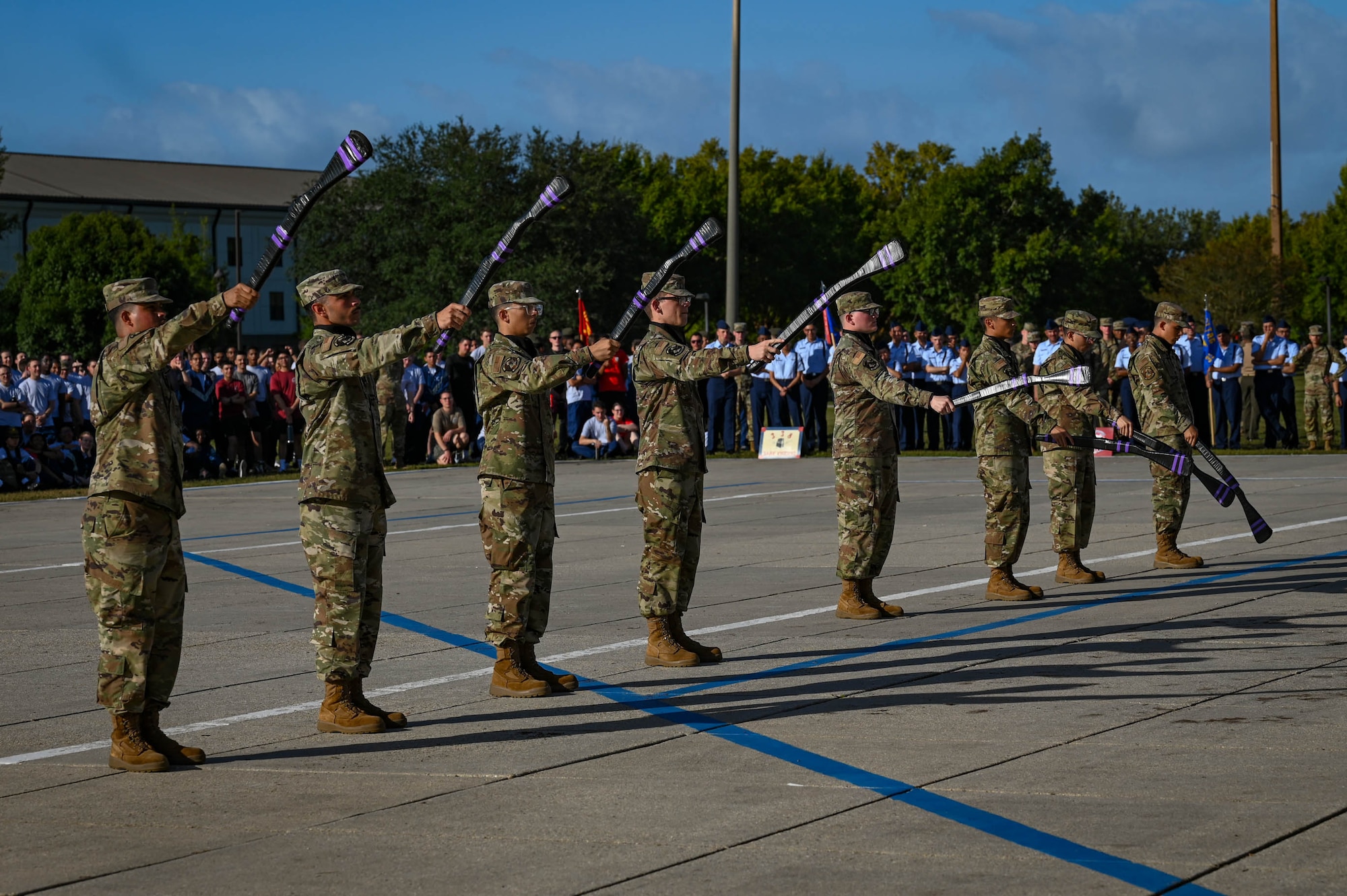 Airmen from the 338th Training Squadron perform a freestyle drill routine at the Fourth Quarter Drill Down competition at the Levitow Training Support Facility drill pad on Keesler Air Force Base, Mississippi, Oct. 27, 2023.