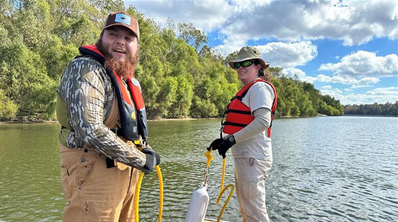 T.J. Rickey, U.S. Army Corps of Engineers, Mobile District biologist, and Morgan Brizendine, U.S. Fish and Wildlife Service, prepare to deploy a bottom troll net in the lower Alabama River in Camden, Alabama, Nov. 20, 2023. The Mobile District, along with the U.S. Fish and Wildlife Service were surveying the lower Alabama River for sturgeon and rare fish species. (Courtesy photo)