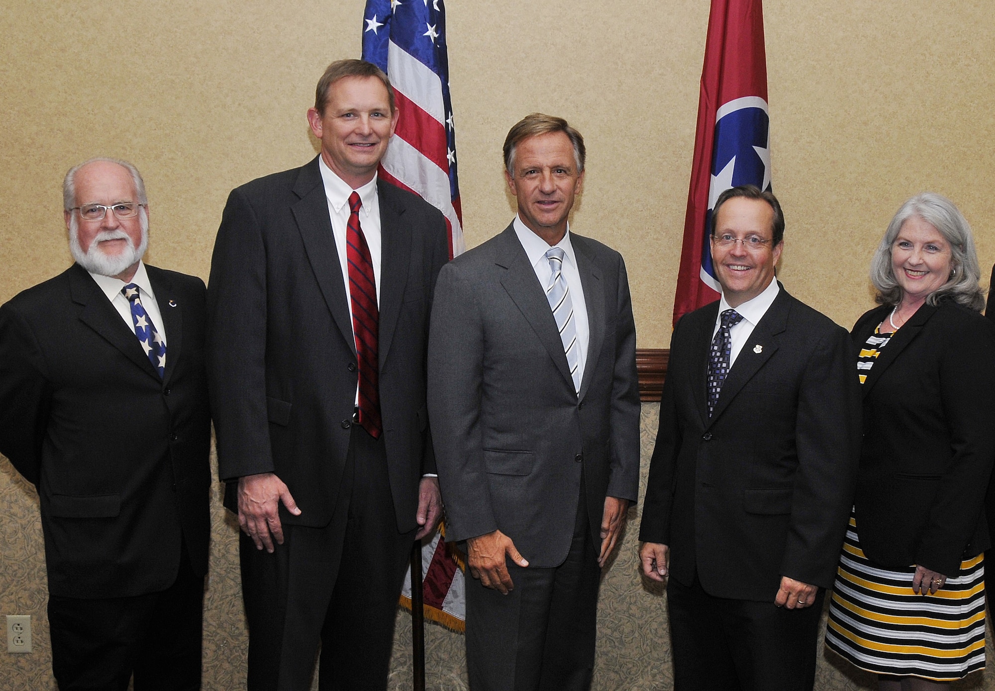 Arnold Engineering Development Complex Fellow and then-Arnold Community Council secretary Claude Morse, left is among the members of the ACC photographed with then-Tennessee Gov. Bill Haslam, center, in October 2014. Also pictured from left is then ACC-vice president Jim Herron, then-ACC-president Jim Jolliffe and then-ACC treasurer Pruda Ross. Morse, who worked at Arnold for more than 30 years and is credited for marketing the capabilities of AEDC to the media, national and international industry, and the local community, passed away Nov. 12, 2023, at the age of 79. (U.S. Air Force photo by Rick Goodfriend)