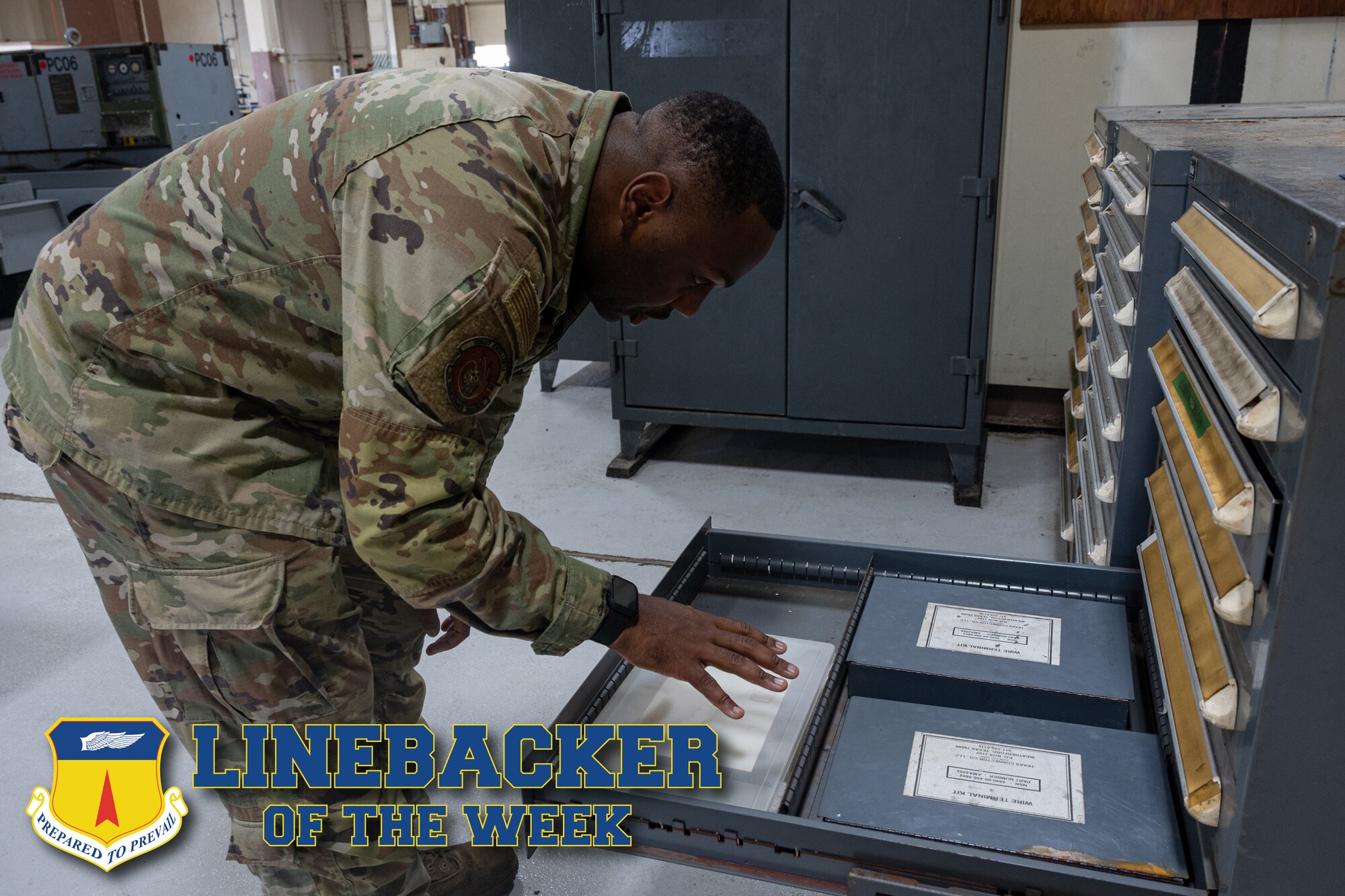 Photo of an Airman checking national stock numbers