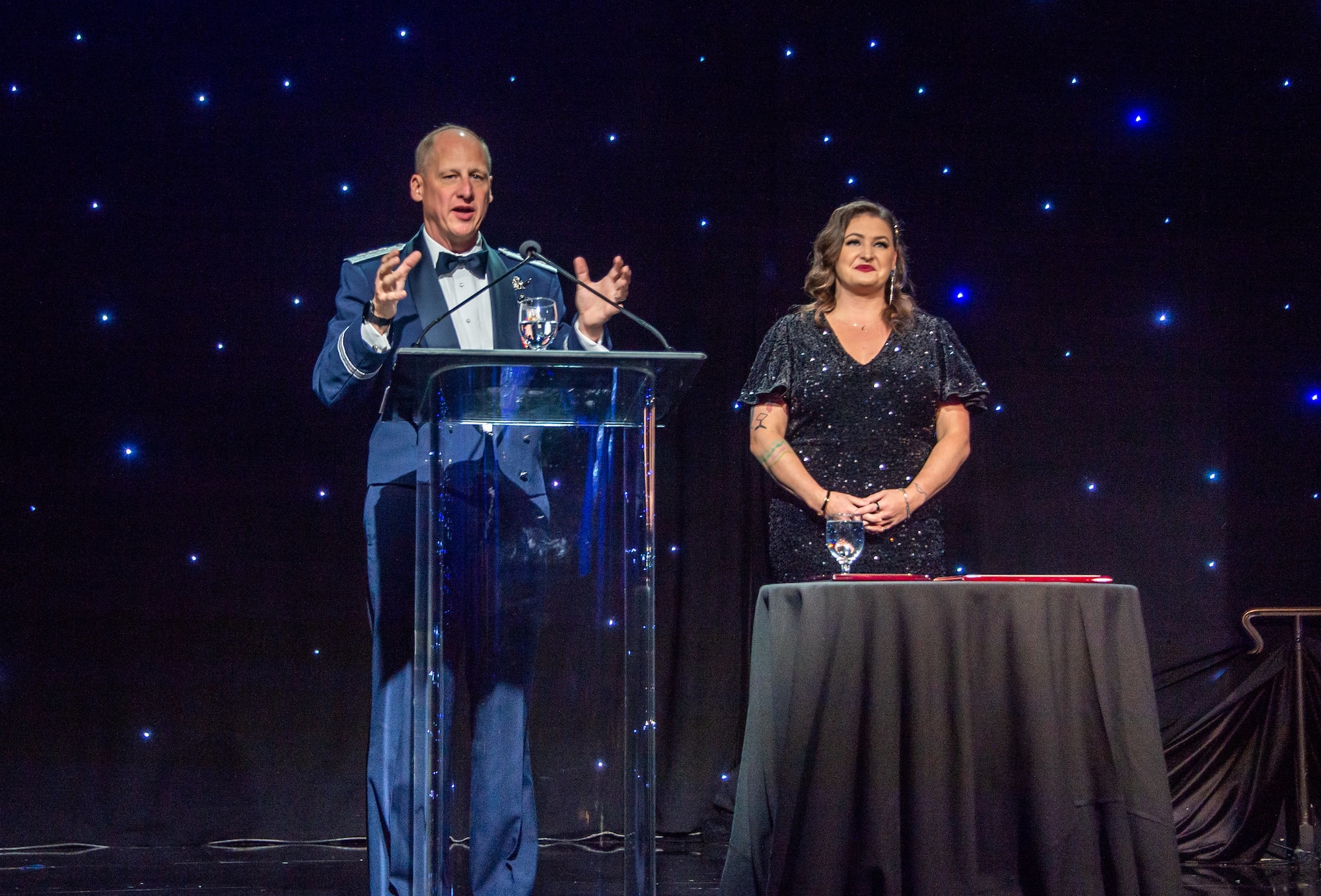 Lt. Gen. Michael Guetlein, SSC commander, (left) congratulates Sage Andorka, deputy branch chief and chief engineer, SSC Cross Mission Data, representing Fight Tonight 2023’s winning team for their Allied Exchange Environment innovation submission, at the Space Force Ball, Nov. 17 in Beverly Hills, Calif. (U.S. Space Force Photo by Van Ha)