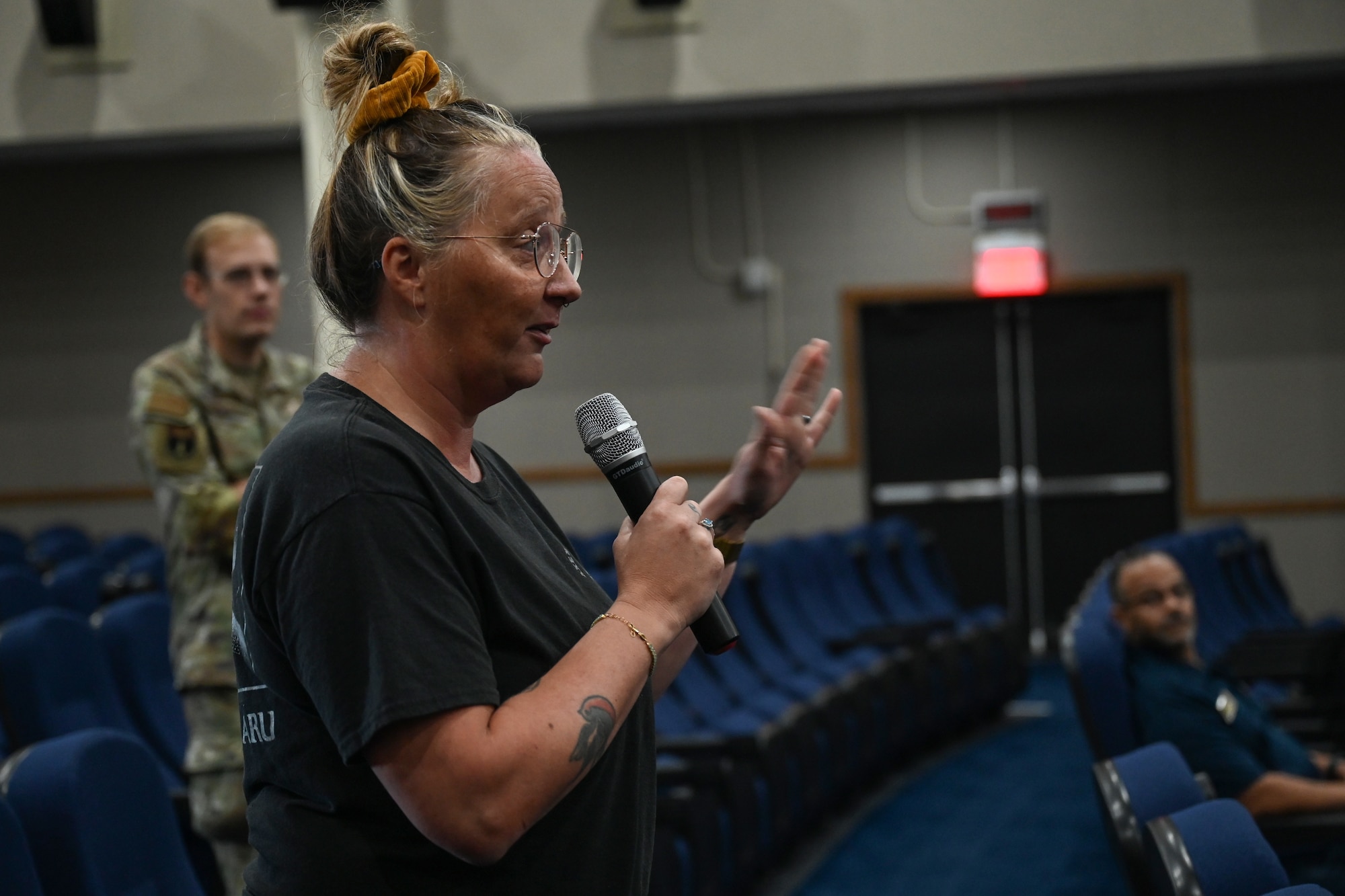 A member of Team Andersen asks a question during a townhall event at Andersen Air Force Base, Guam, Nov. 17, 2023.